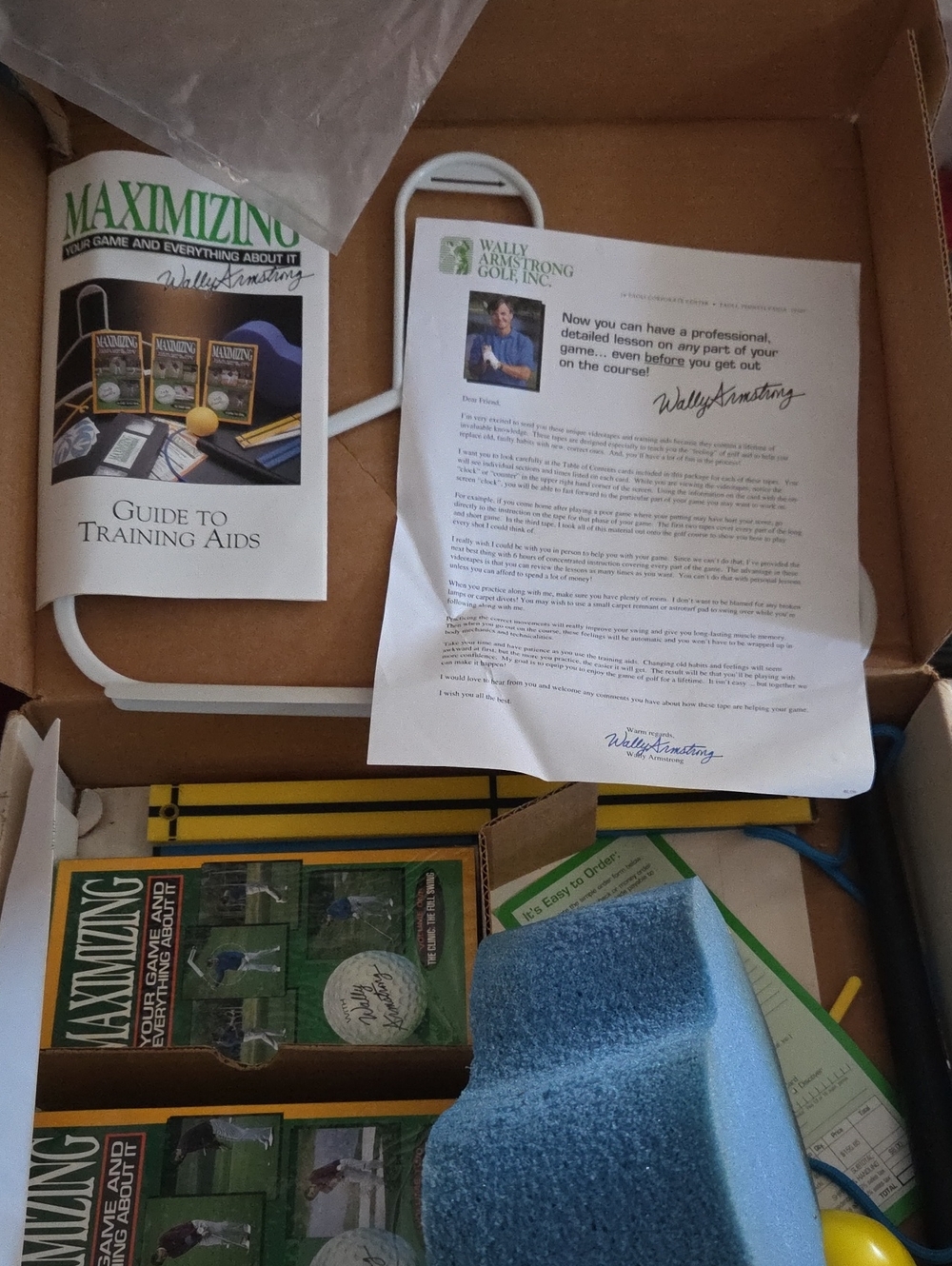 Maximizing Your Game and Everything About It" golf training guide and video set
